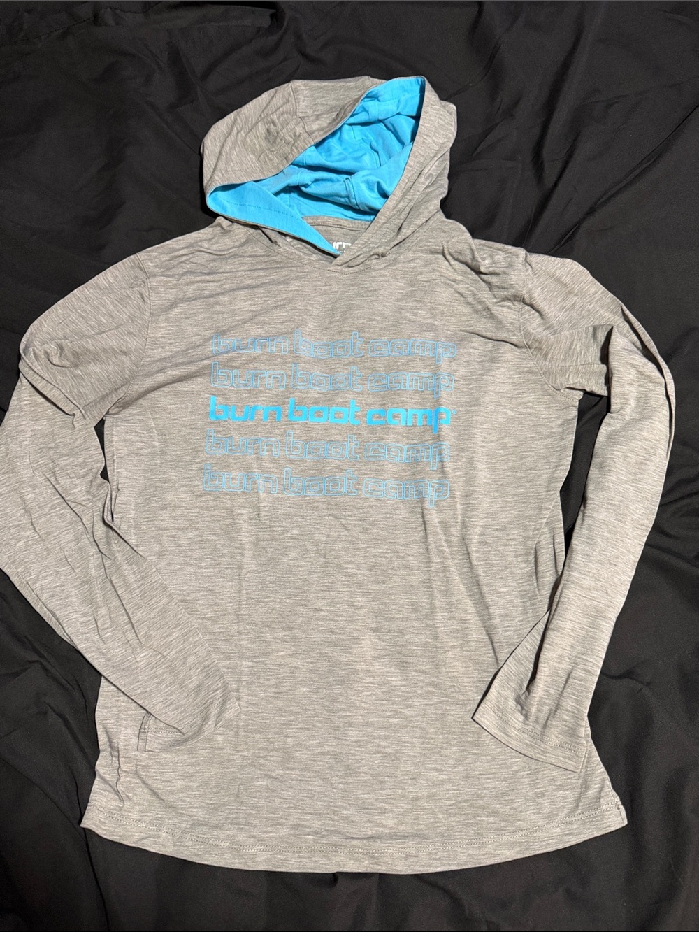 Burn Boot Camp Women’s Long Sleeve Hoodie Tee in Light Gray with Blue Accent